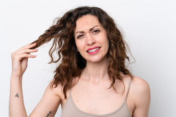 Obraz premium Young caucasian woman isolated on white background with tangled hair. Close up portrait