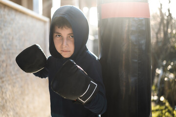 Teenager In Boxing Gloves And Sportswear.