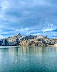 mountain reflected on the lake with snow and cold