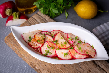 Turkish appetizers; sliced radish appetizer with sour, Turkish name; Turp mezesi