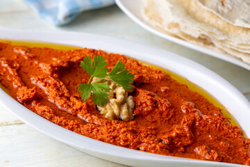 Traditional delicious Turkish appetizer, Muhammara, healthy walnut and roasted red bell pepper dip