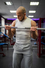 Naklejka premium Athlete with a barbell