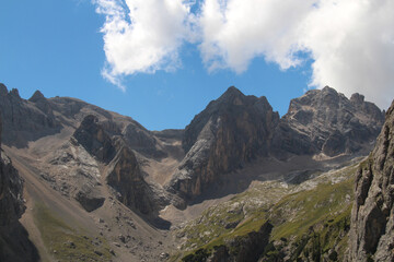 Mountain massif in a sunny day. Valle Ombretta, Italian Alps.