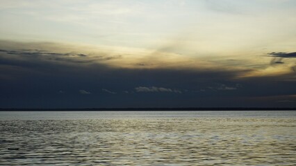 sunset over the Amazon river