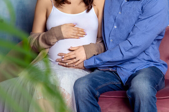 Parents-to-be expecting a baby. Unrecognizable caucasian couple.