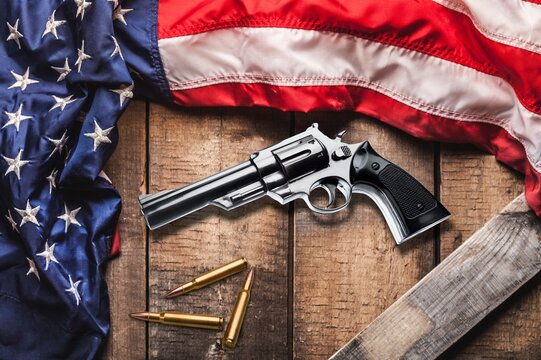 Bullets with an USA flag on a wood background