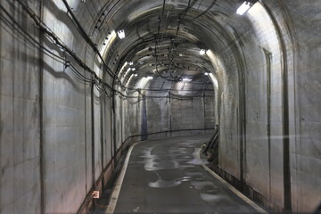 Fototapeta na wymiar Toyama,Japan - April 23, 2022: Interior of Tateyama Tunnel, a part of Tateyama Kurobe Alpine Route Japan 