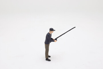 a fun of tiny figures on fishing