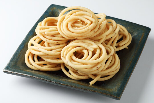 Traditional Indian Diwali snacks Chakali,murukku, Indian Traditional Tea Time Snack Chakli, a deep fried snack, It is known as Chakali, Murukku, Muruku, Murkoo, Chakri