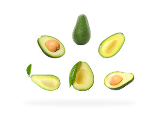 Composition with fresh avocados isolated on white