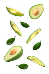 Fresh cut flying avocados isolated on white