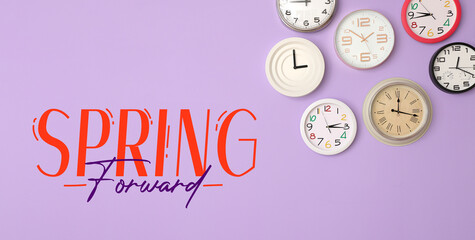 Different clocks on lilac background. Spring forward