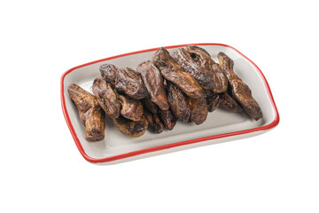 A white plate with dried bananas isolated on a white background.