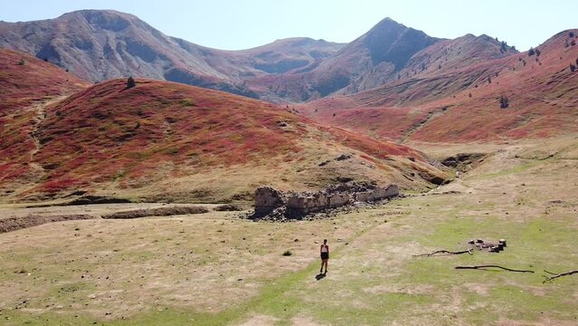 Female Hiker Walks to a Ruin in Prokletije National Park, Montenegro - Dolly