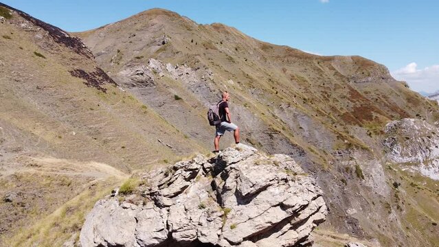Man On Top of The Mountain at Prokletije National Park, Montenegro - Circle Pan