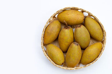 Fresh sapodilla fruit on white background