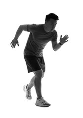 Silhouette of sporty male runner on white background