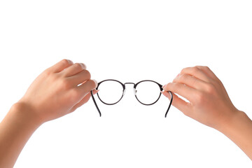 Female hands with new modern eyeglasses on white background