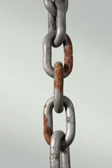 Real steel rusty iron chain isolated on white background.