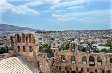 Odeon of Herodes Atticus Theater at Acropolis behind Athens City in Greece. The building was completed in AD 161 and then renovated in 1950. 