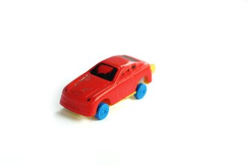 Fototapeta na wymiar Close-Up Of Children's toy Car On White Background.