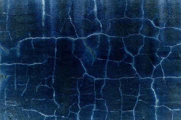 Aged vintage textured denim blue cement background