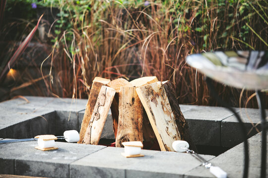 A View Of A Modern Fire Pit In An Urban Area. 