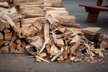 A view of a large pile of prepared fire wood.