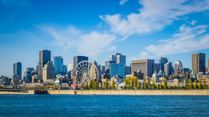Fototapeta premium View on Montreal skyline, with Mount Royal in the background from the Jacques Cartier bridge, on a clear fall day