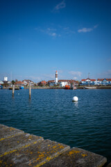 Fototapeta na wymiar port of Poel with the lighthouse in the background