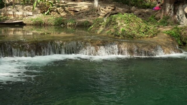 waterfalls and crystal clear water pools in tamasopo