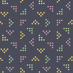 Seamless pattern with colored triangles and circles on a dark background