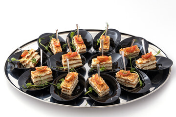 Party platter of bite size appetisers. Appetizer canape. Catering