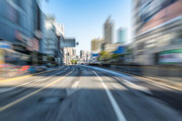 Fototapeta na wymiar Blurred urban traffic in city.