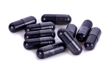 Charcoal Capsule isolated on white background