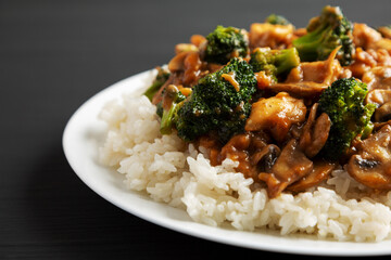 Homemade Chicken Veggie Stir Fry with White Rice, side view. Close-up.