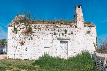 White old farm, finca or cottage in the countryside in Puglia, Italy, Europe