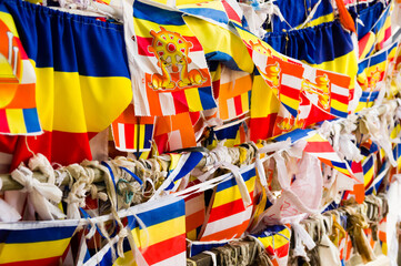 Colourful buddhist prayer flags hangin in lines