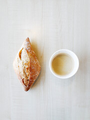 Baked French bread on wooden table