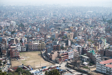 Fototapeta na wymiar Kathmandu, Nepal- April 20,2022 : Panoramic top view of Katmandu city from Swayambhunath stupa.