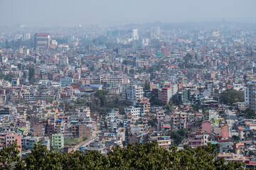 Fototapeta na wymiar Kathmandu, Nepal- April 20,2022 : Panoramic top view of Katmandu city from Swayambhunath stupa.