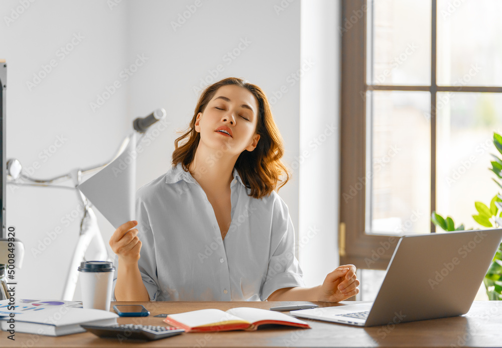 Wall mural woman working in office