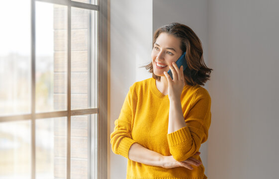 woman is having conversation by phone