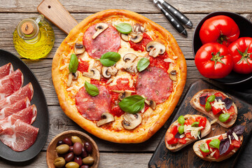 Italian cuisine. Pizza and toasts