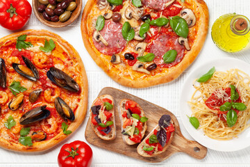 Italian cuisine. Pizza, pasta and toasts