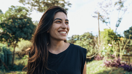 Smiling latin Brazilian woman in the farm. Joy, positive and love. - obrazy, fototapety, plakaty