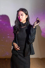 Fashionable concept, Portrait of fashion woman wearing black dress to posing on space background