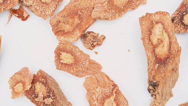 top view herb DangShenPian or Codonopsis Radix or Pilose Asiabell Root slices rotating
