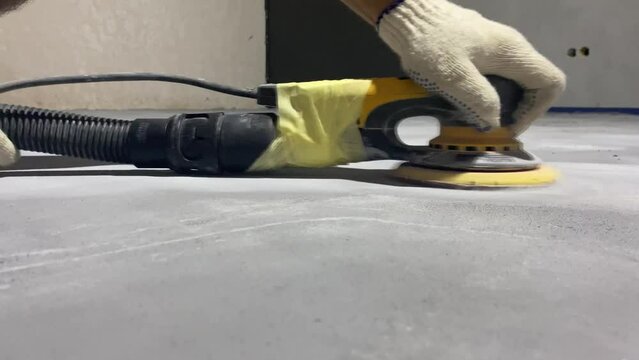 Floor grinding for decorative microcement finishing