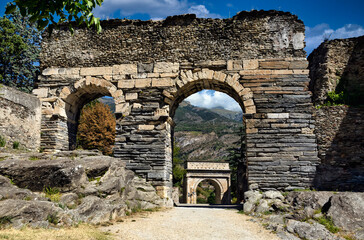 Ruins of ancient roman aqueduct in Susa, Italy